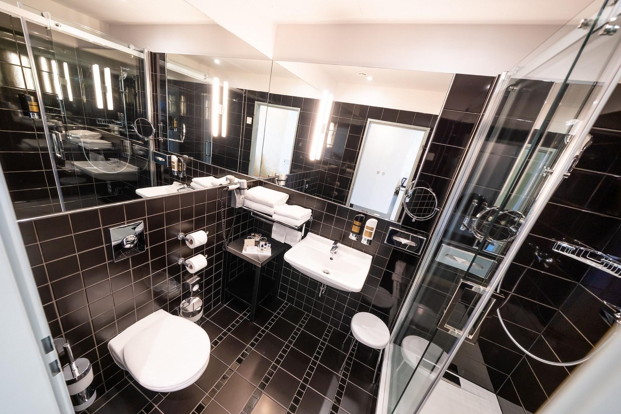 Grandium Hotel Prag Dış mekan fotoğraf A bathroom at the hotel