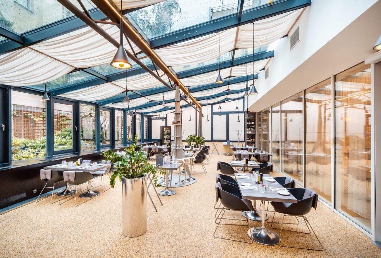 Grandium Hotel Prag Dış mekan fotoğraf The restaurant's interior
